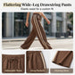 Outfit con top corto a blocchi di colore e pantaloni a zampa